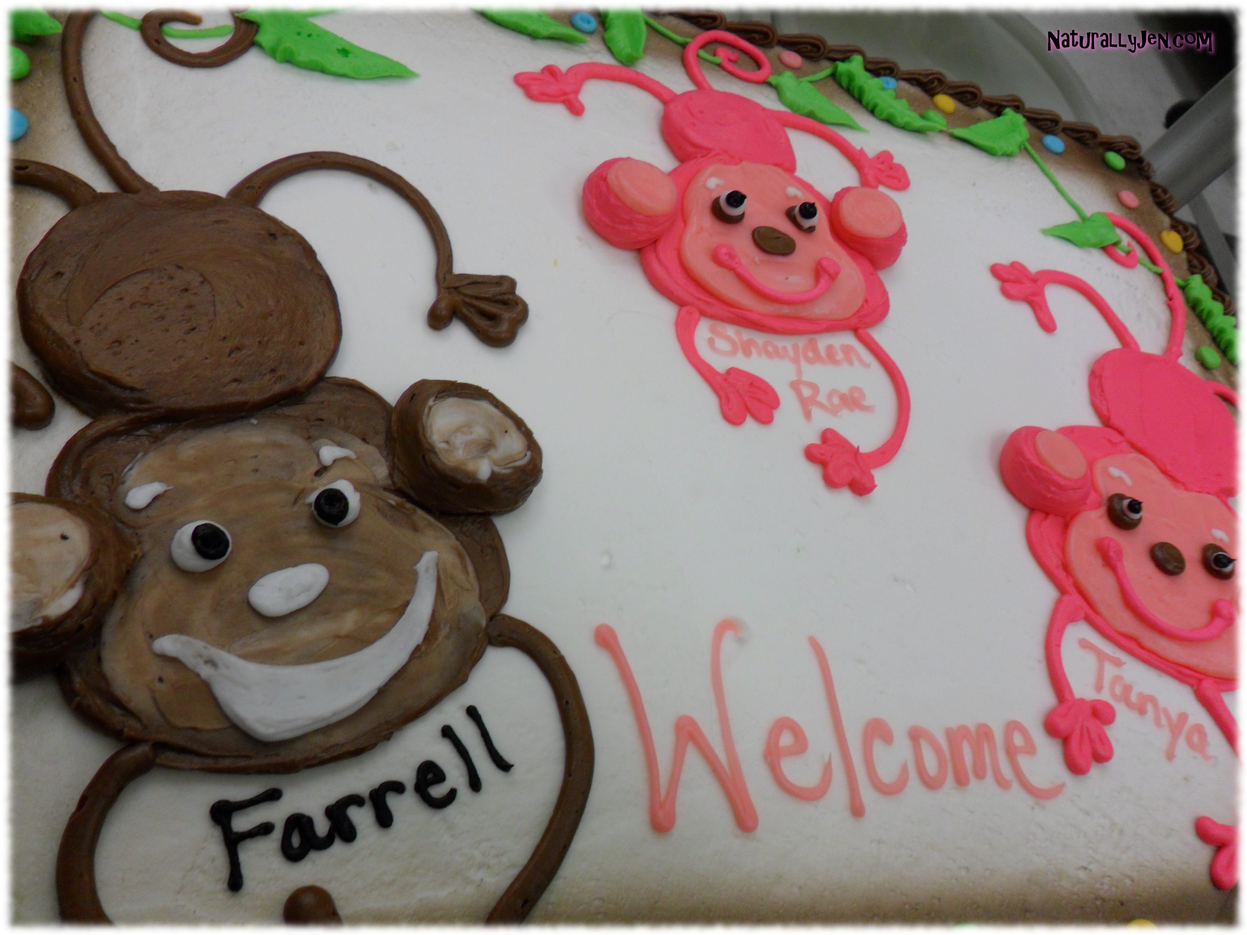 Frosting Monkeys on Welcome Back To Work Cake